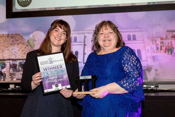 Business owner Rachel Terry takes the trophy for Best Customer Service